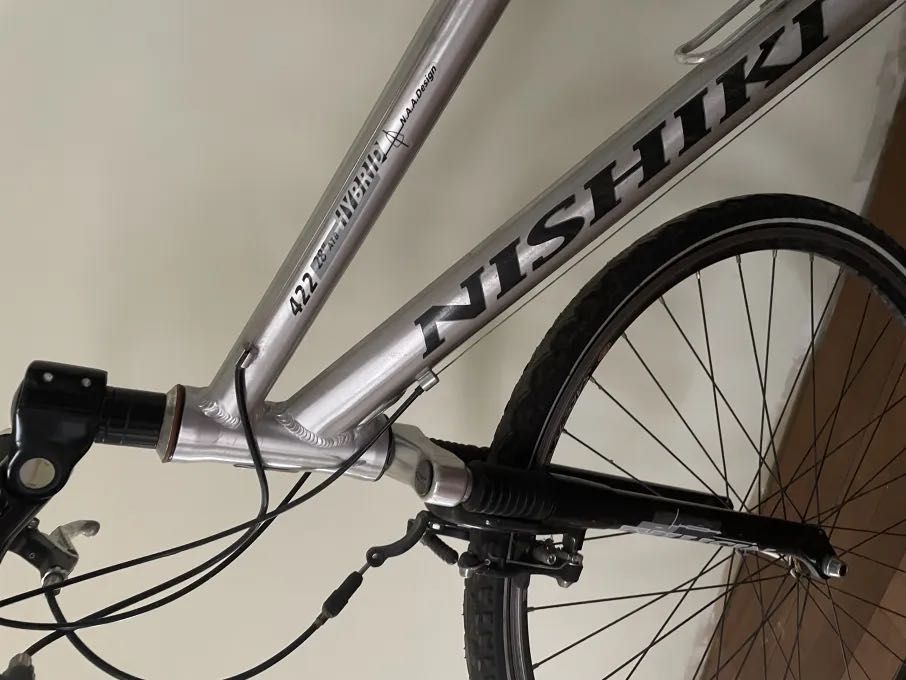 Bicicleta trekking barbati Shimano XT si bicicleta dama Nishiki Hybrid