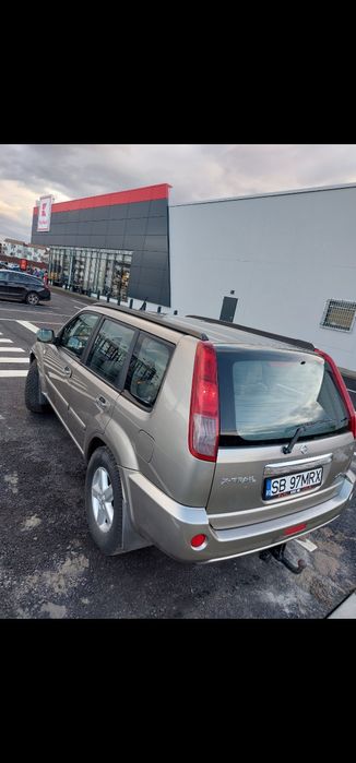 Nissan x trail 2006        ( schimb cu basculabila sau escavator )