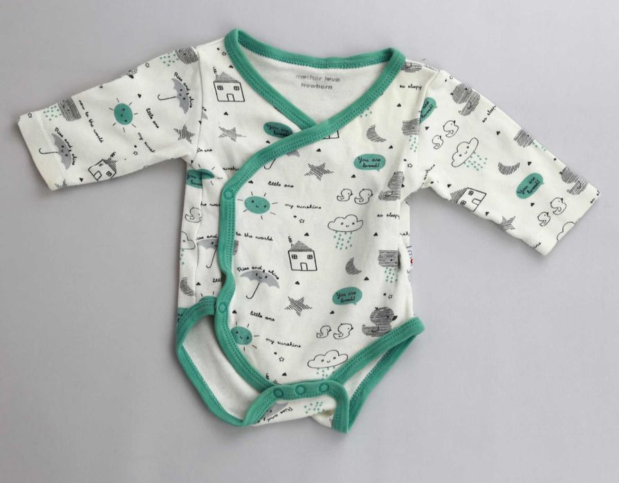 Лот от красиви бебешки дрешки от органичен памук на различни брандове.