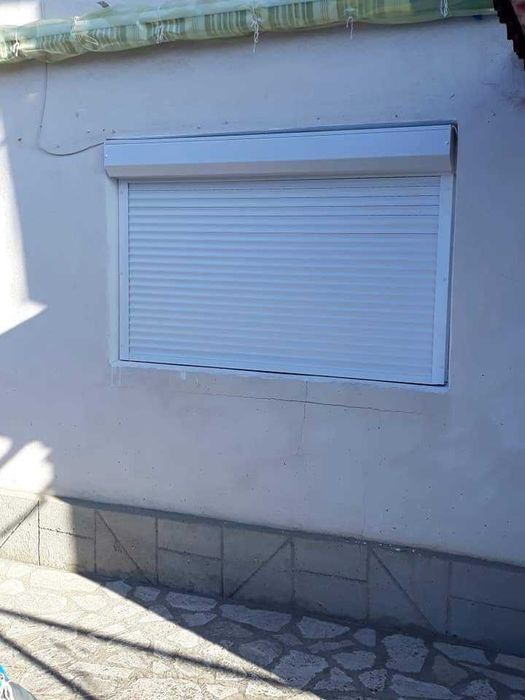 RULOURI Aluminiu si Usi de garaj rezidentiale SECTIONALE