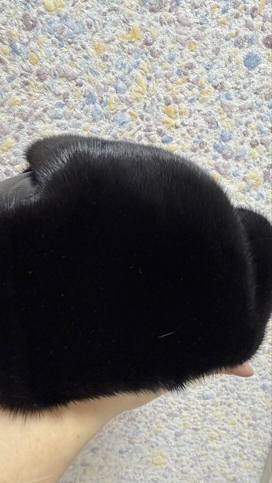 Продам новую шапку-ушанку унисекс норка /кожа