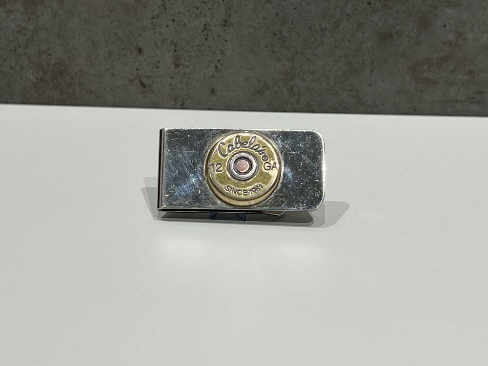 Money clip Cabela’s 12 GA cartuș