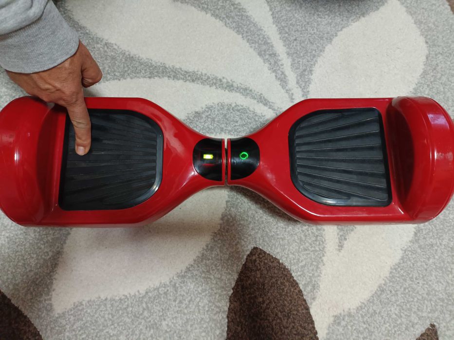 Vând Hoverboard rosu perfect funcțional