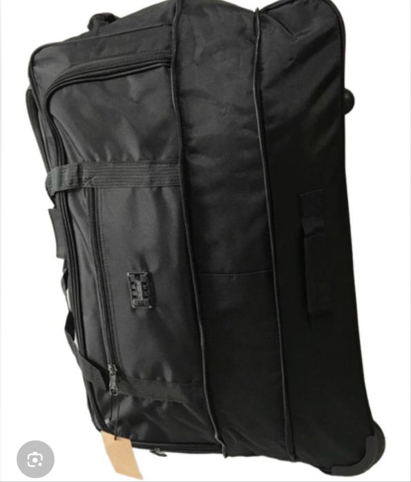 Дорожная сумка с тремья колесами.