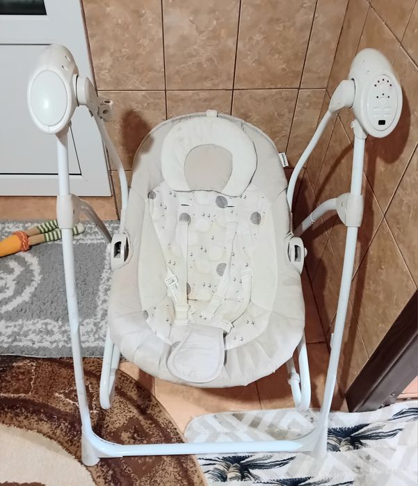 Leagăn electric pentru bebe..