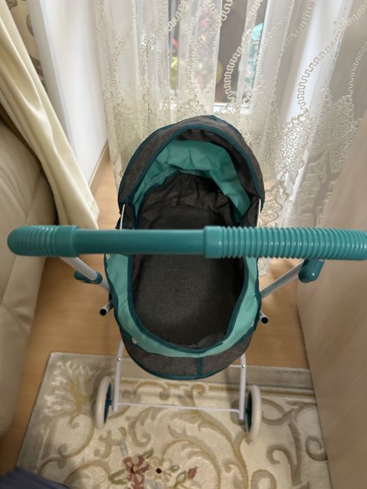 Продам игрушечную коляску