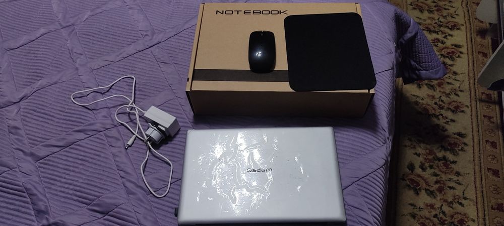Ноутбук . Qadam .