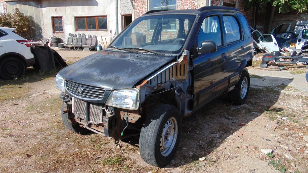Dezmembrez daihatsu Terios motor 1.3 curea 4x4 manual volan stanga