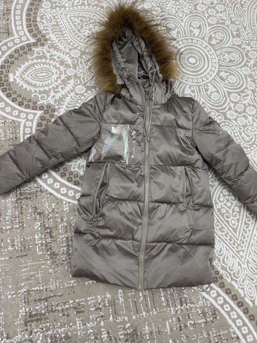 Продам зимнюю куртку на девочку