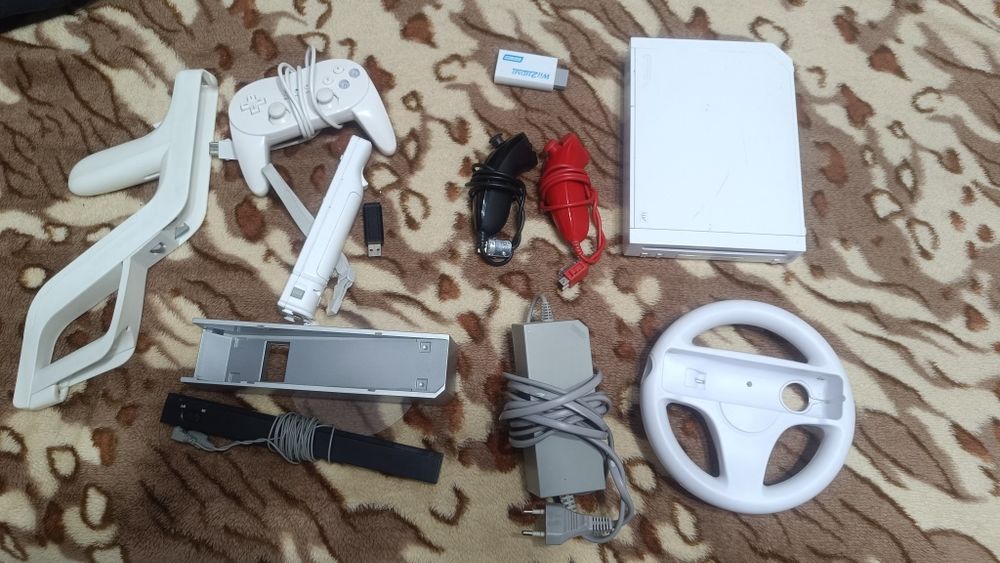 Vând consola Wii modata cu accesorii