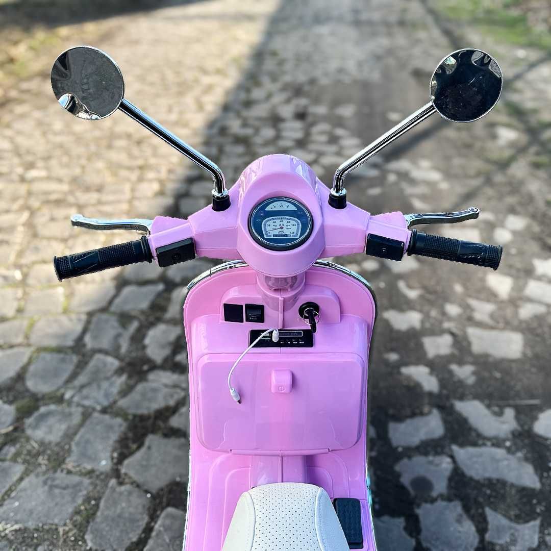 Scuter electric Piaggio Vespa PX150 cu roti moi si scaun tapitat, Pink