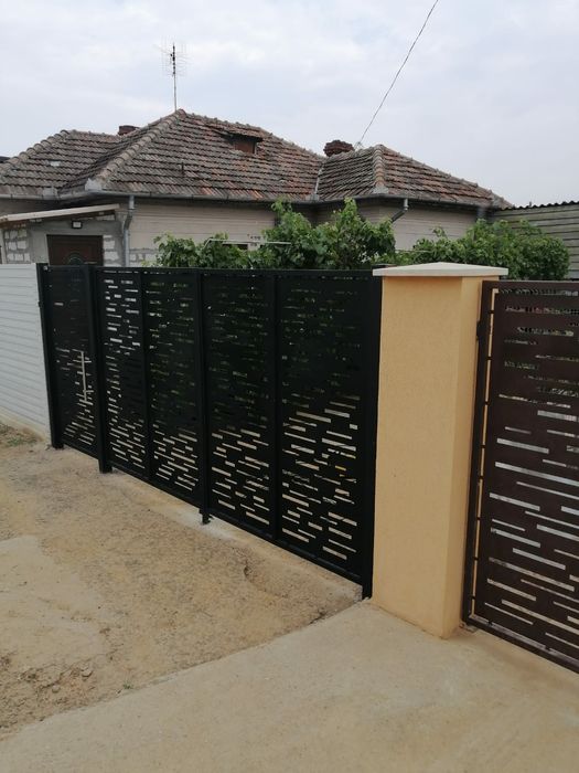 Porți, garduri tabla ,  debitate laser