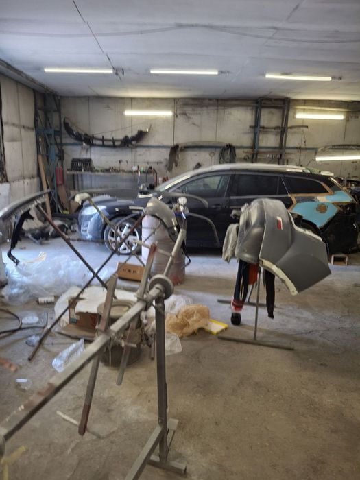 Автосервиз с камера за боядисване