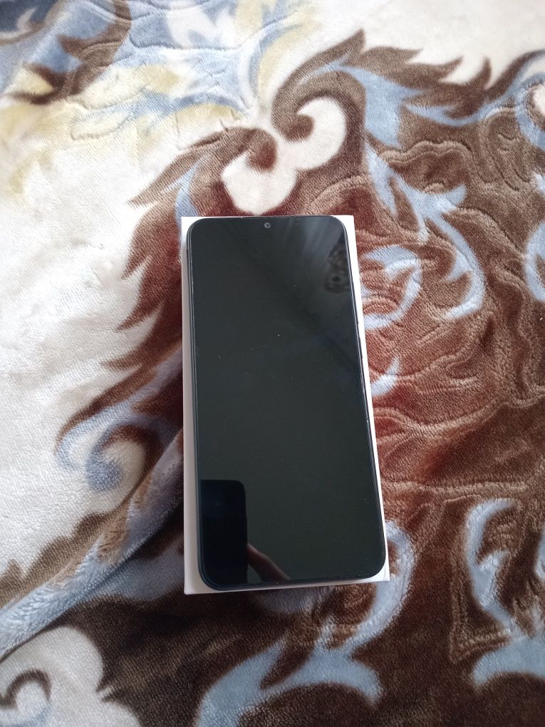 Redmi 9c este ca nou