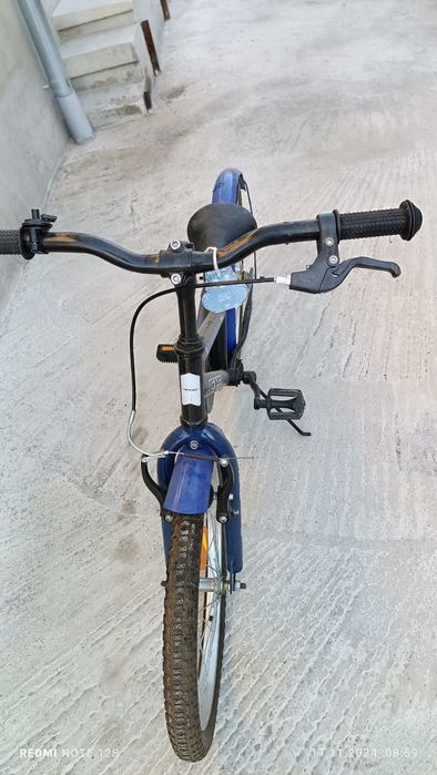 Bicicleta aproape noua