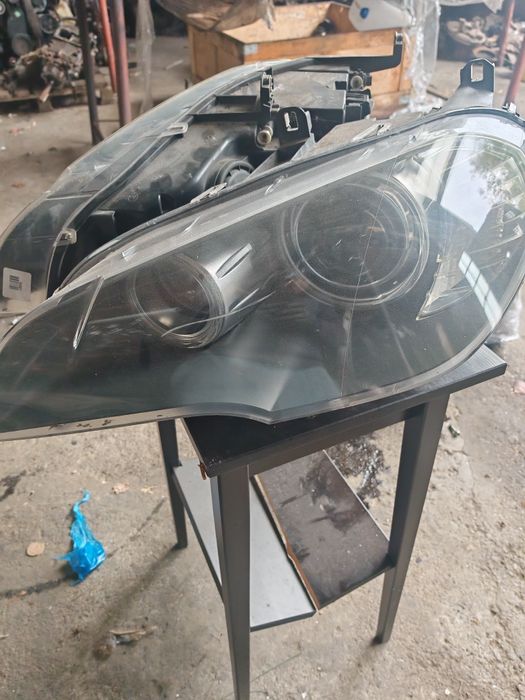 Far bmw e70 model cu lupa