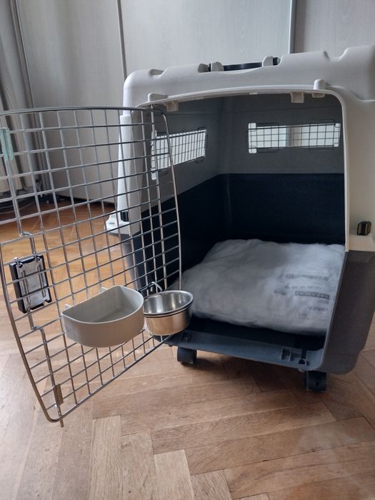 Транспортна клетка за куче на колелца