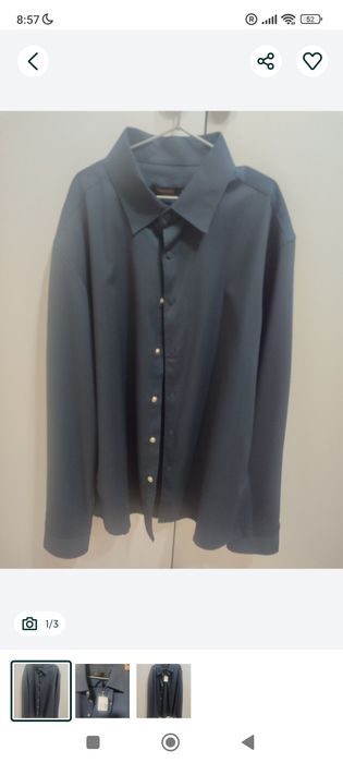 Продам синюю рубашку новую размер М