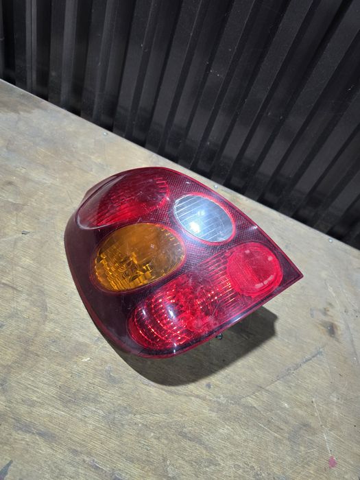 Стоп сигнал фонарь левый Тойота Королла 110 хэтчбек Toyota Corolla