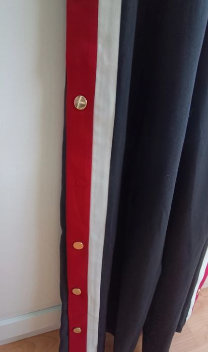 Pantaloni cu crac larg