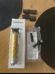 Trimmer , auriu sau negru