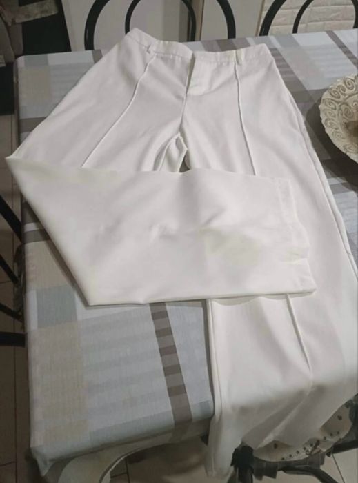 Pantaloni albi eleganti