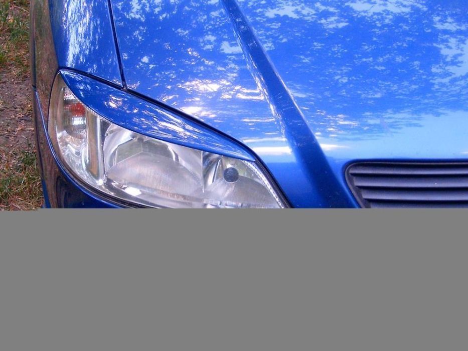 pleoape faruri opel astra g