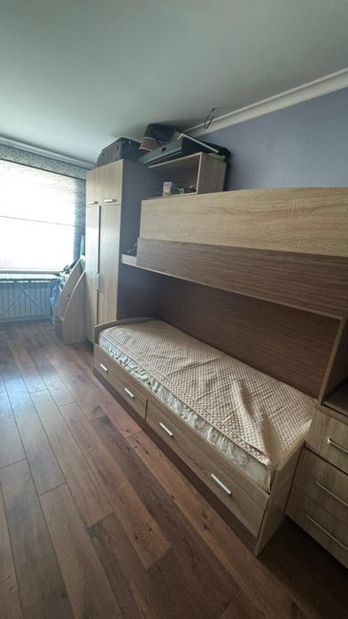 Продаю двух этажную кровать с шкафом и полками