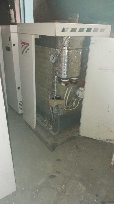 Котел Оптима на свете и газе