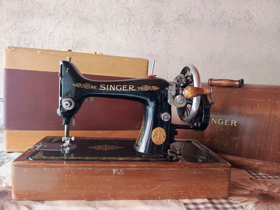 Masini de cusut manuale marca Singer