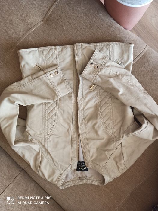 Продам женскую куртку