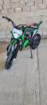 Motocross motoretă Pocket  KXD PRO Germany 49cc roti 10 inch suspensie