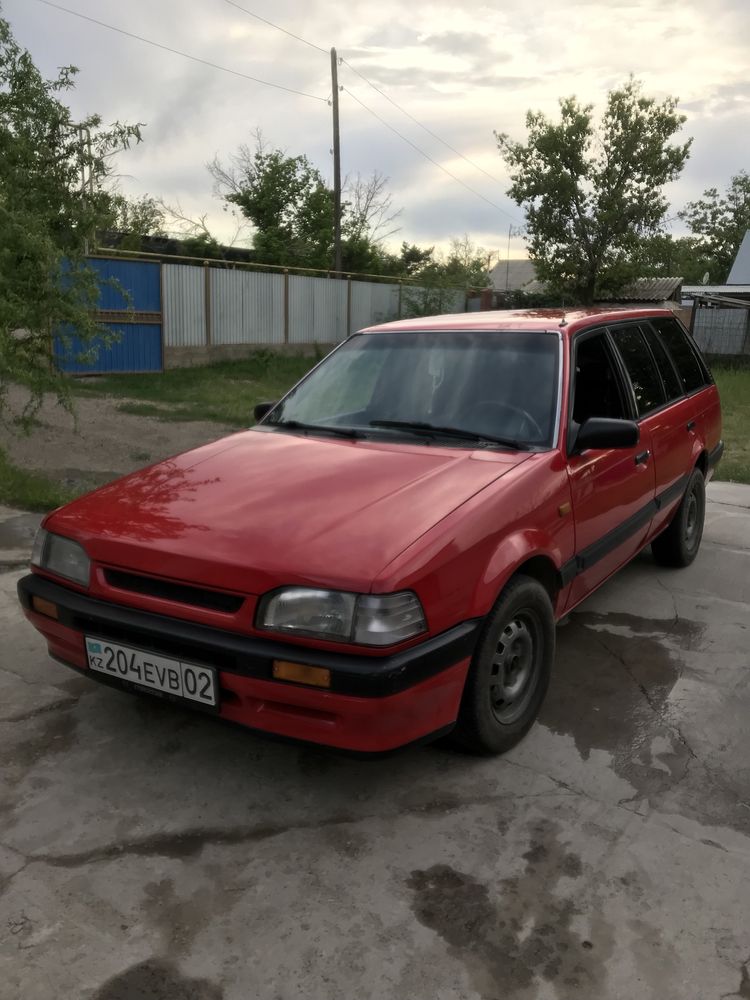 Mazda 323 Год 1993 обьем1,6