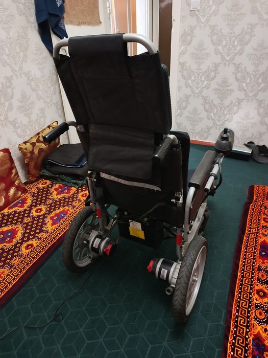 Электронная коляска для инвалидов