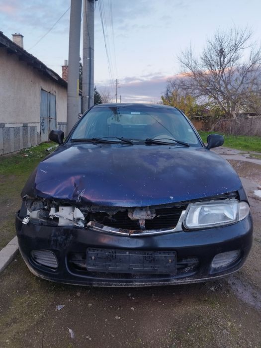 Mitsubishi carisma на Части.