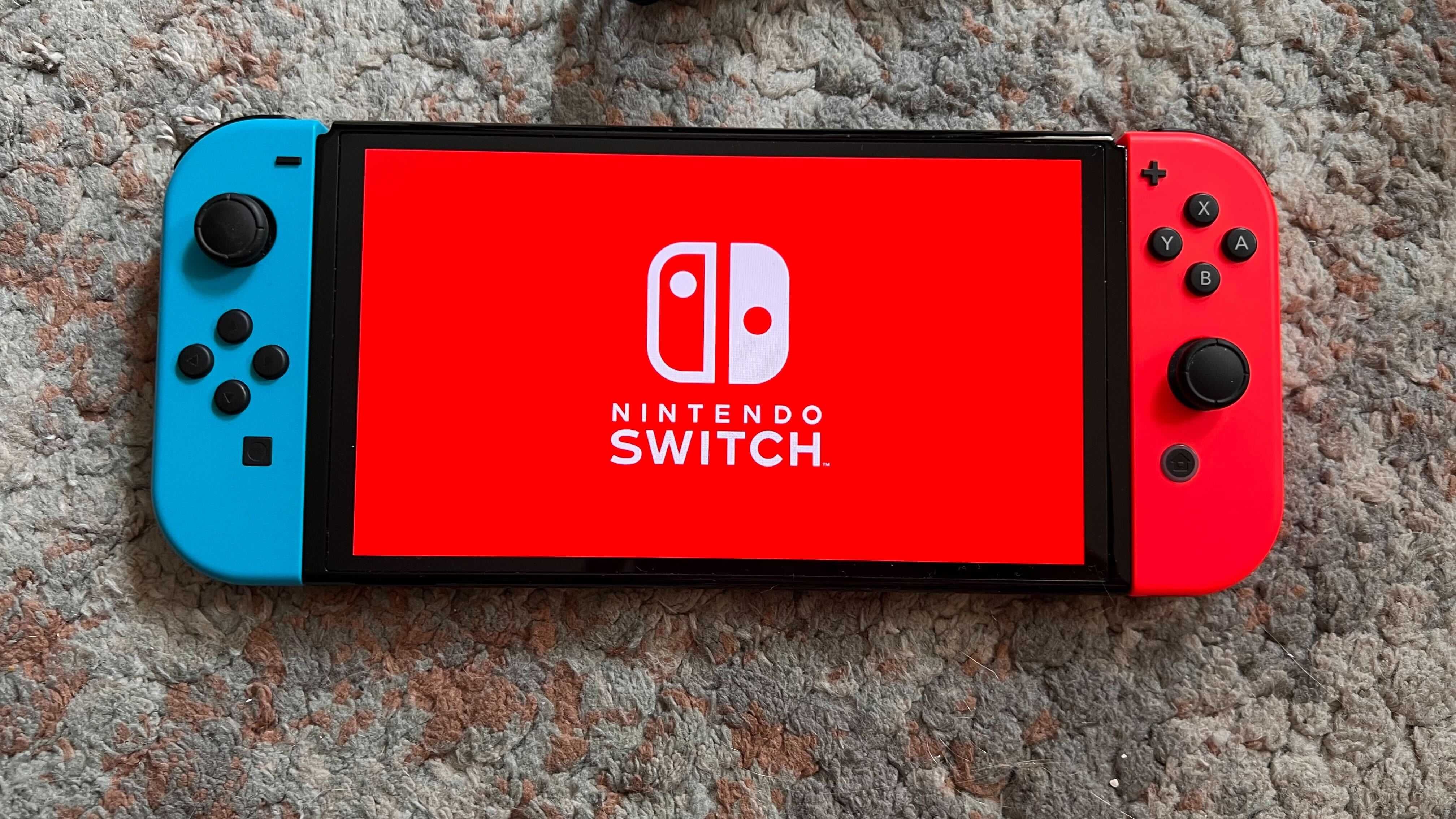 Nintendo Switch OLED с Гранация и карта памет