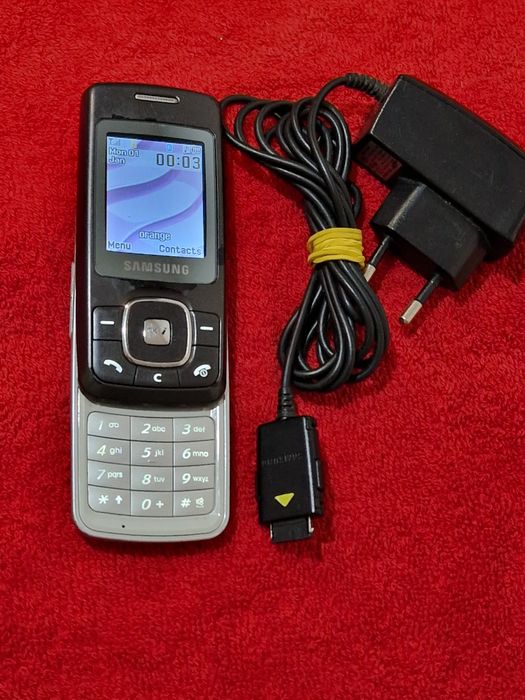 Telefon Samsung slide SGH-M610 cu încărcător original
