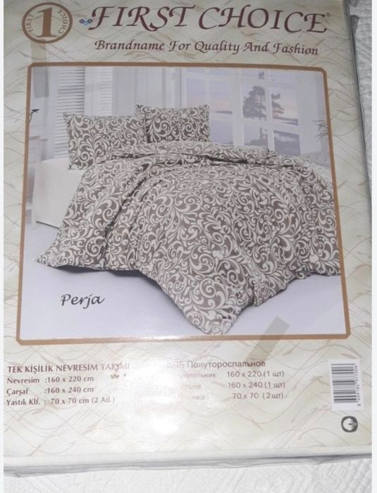 Lenjerie de pat noua formata din cearceaf ,doua fete de perna,si husa