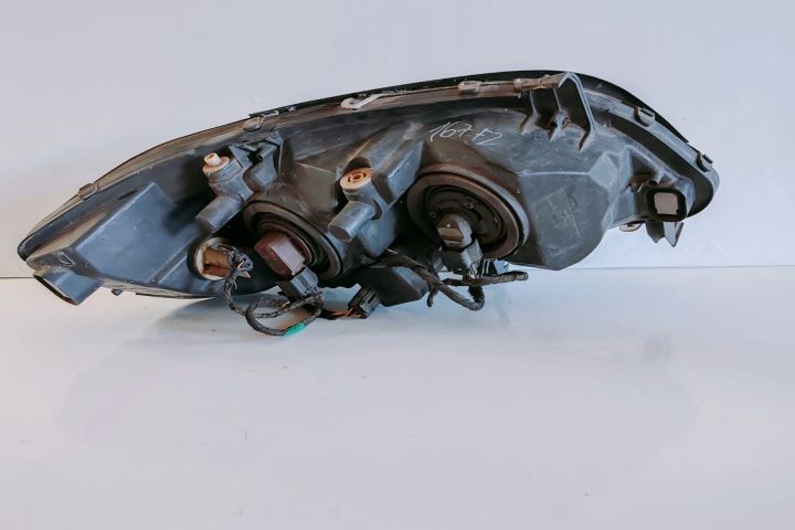 Far stanga cu cleme rupte 89100054 Opel Zafira A