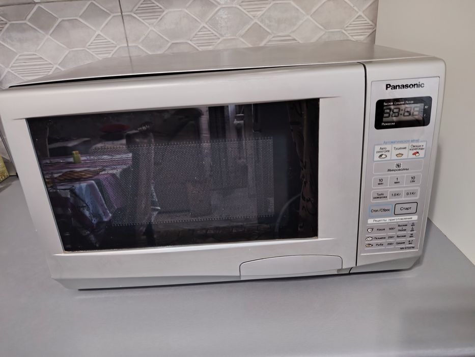 Продам микроволновку в отличном состоянии,цвет серый металлик