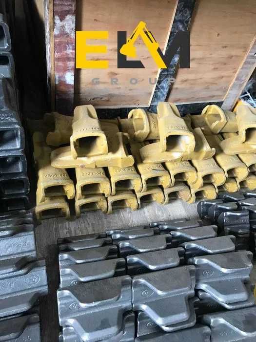 Клыки, коронки, зубья адаптера на ковш спецтехники