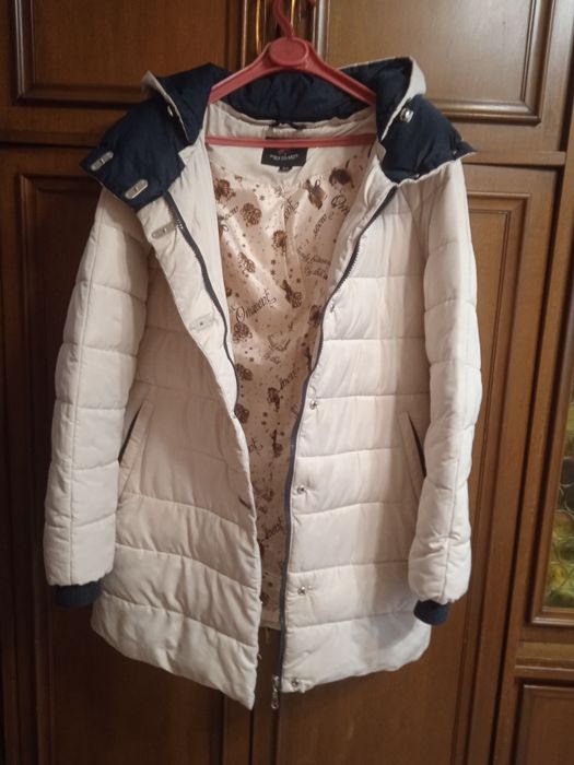 Молочный пуховик