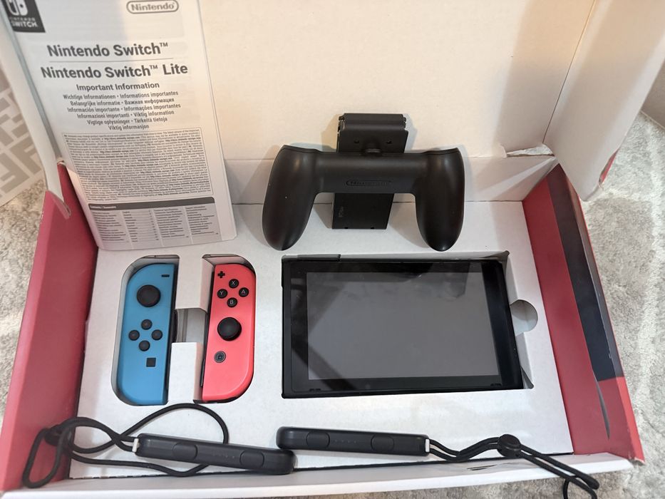 Vand nitendo switch putin folosit