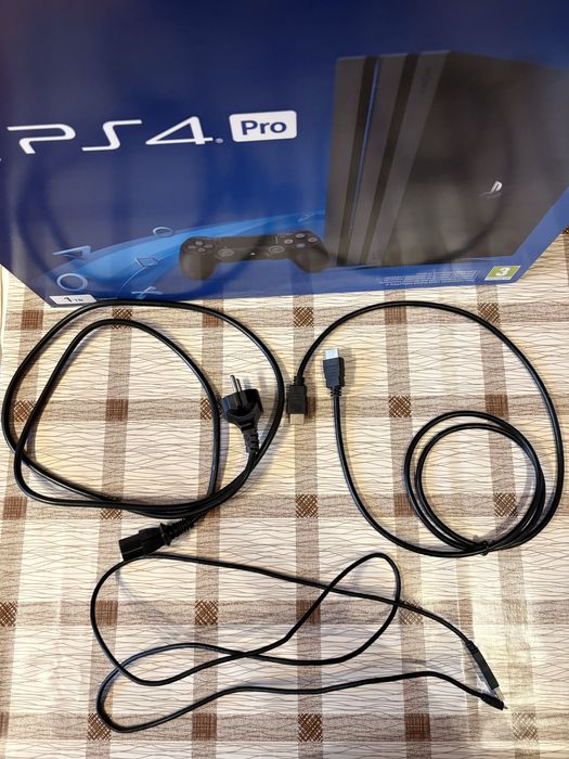 PlayStation 4 Pro 1TB - с подарък 6 игри