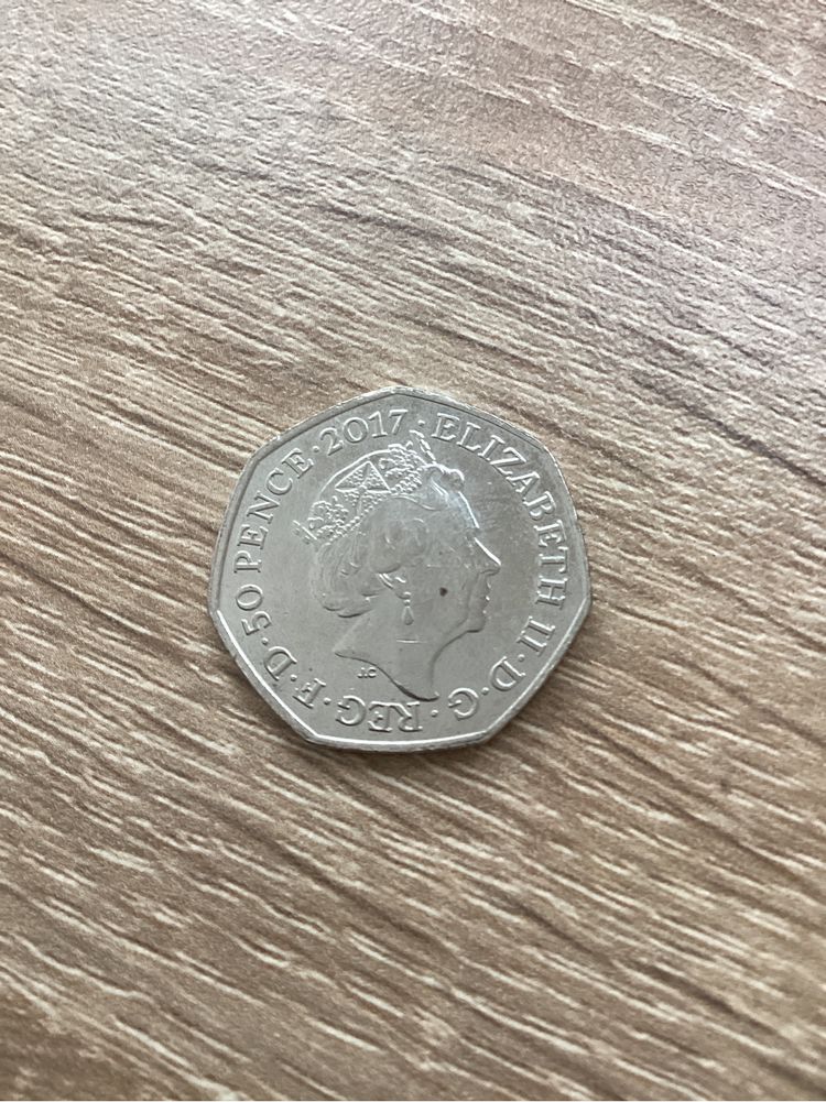 Отсечена монета  Кралица Елизабет II / Tom Kiten