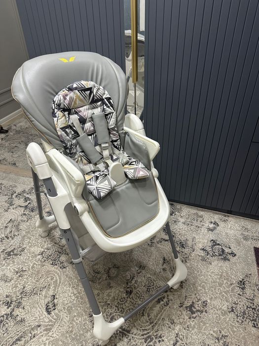 Детский стульчик для кормления фирма Текнум