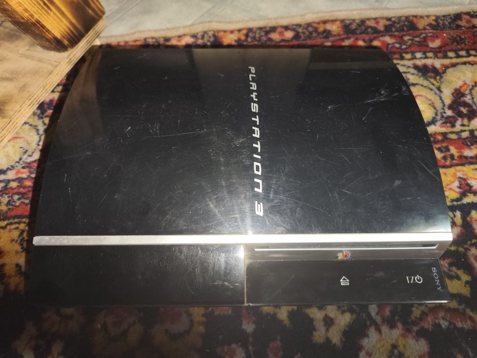 PS 3 cu volan și 10 jocuri vând schimb