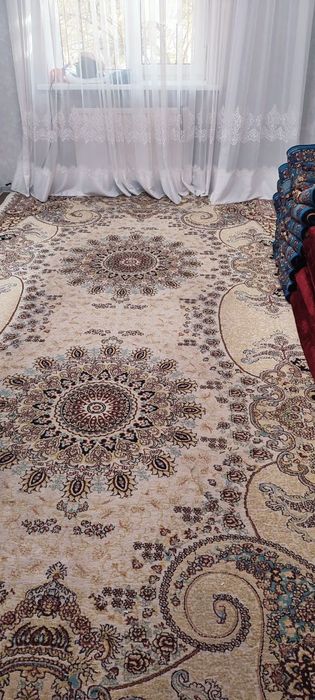 Ковёр в хорошом состояние
