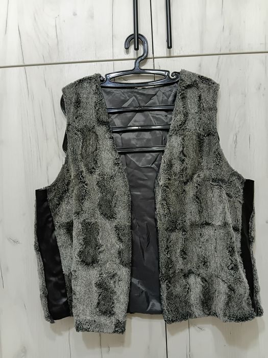 Елек с кожени елементи