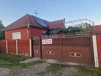 Casa la tara de vanzare